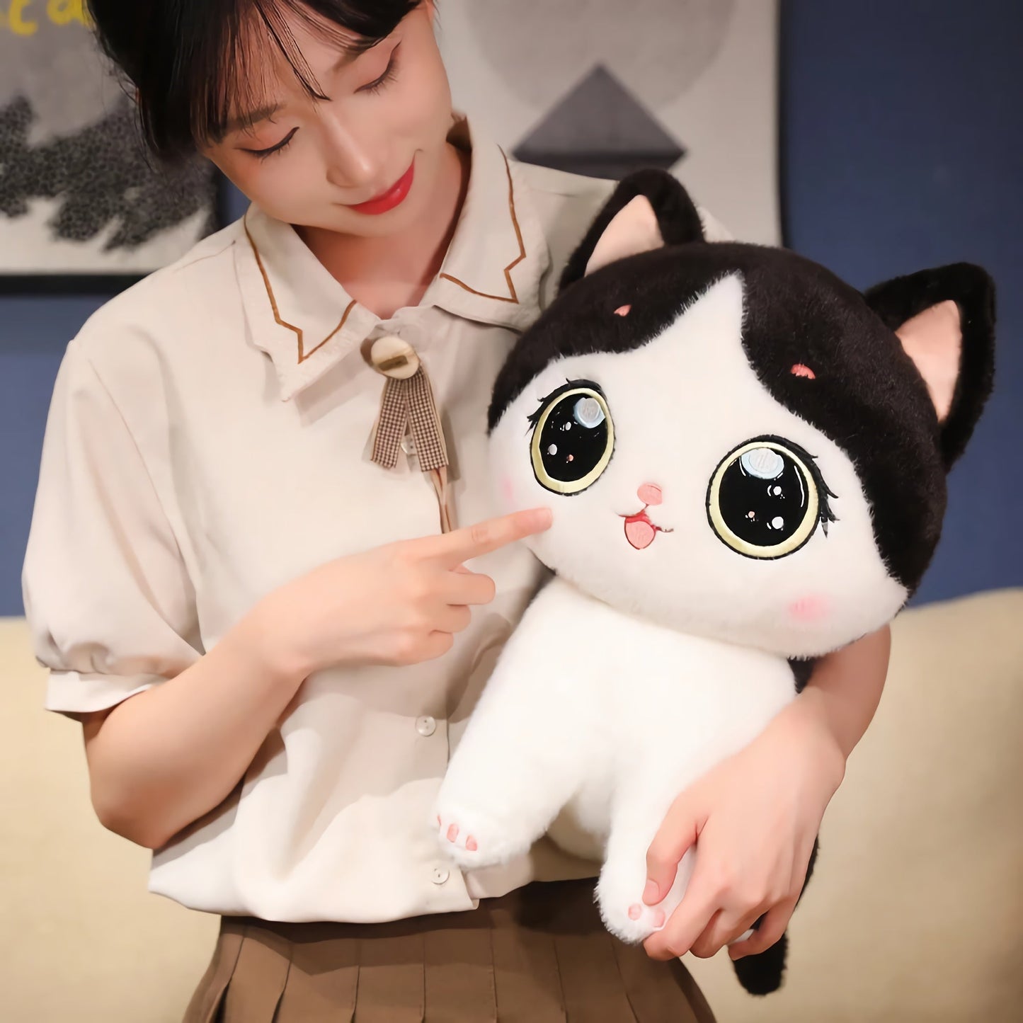Cute kitten plush toy with large eyes