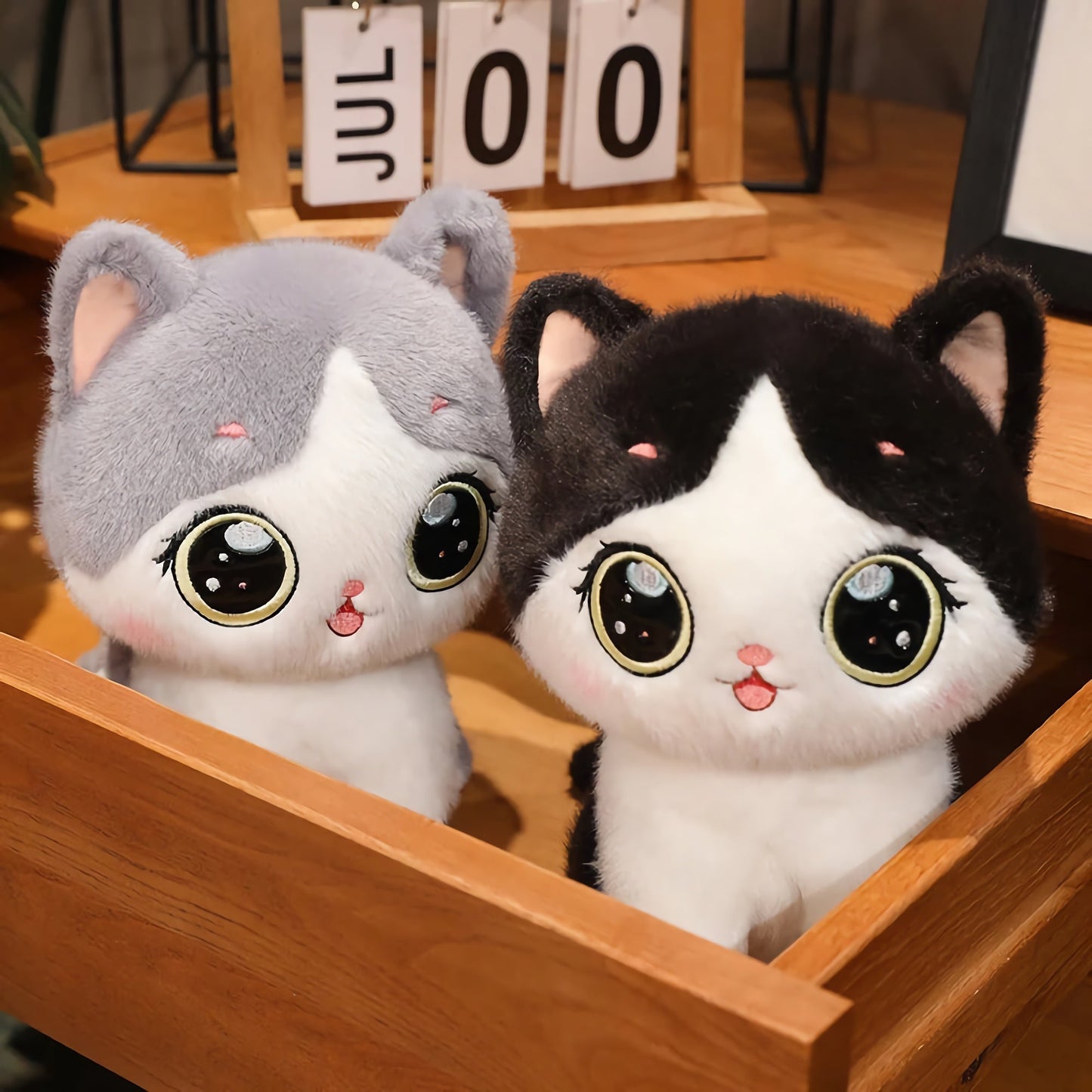 Cute kitten plush toy with large eyes