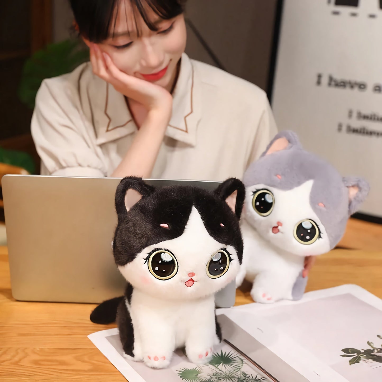 Cute kitten plush toy with large eyes