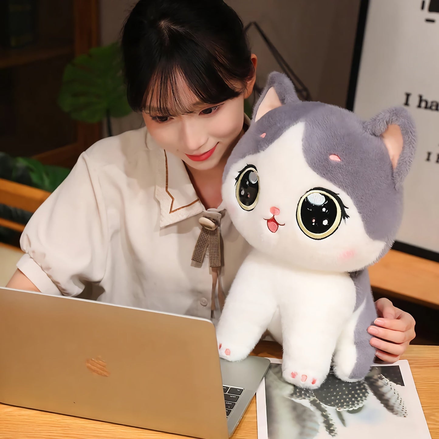 Cute kitten plush toy with large eyes