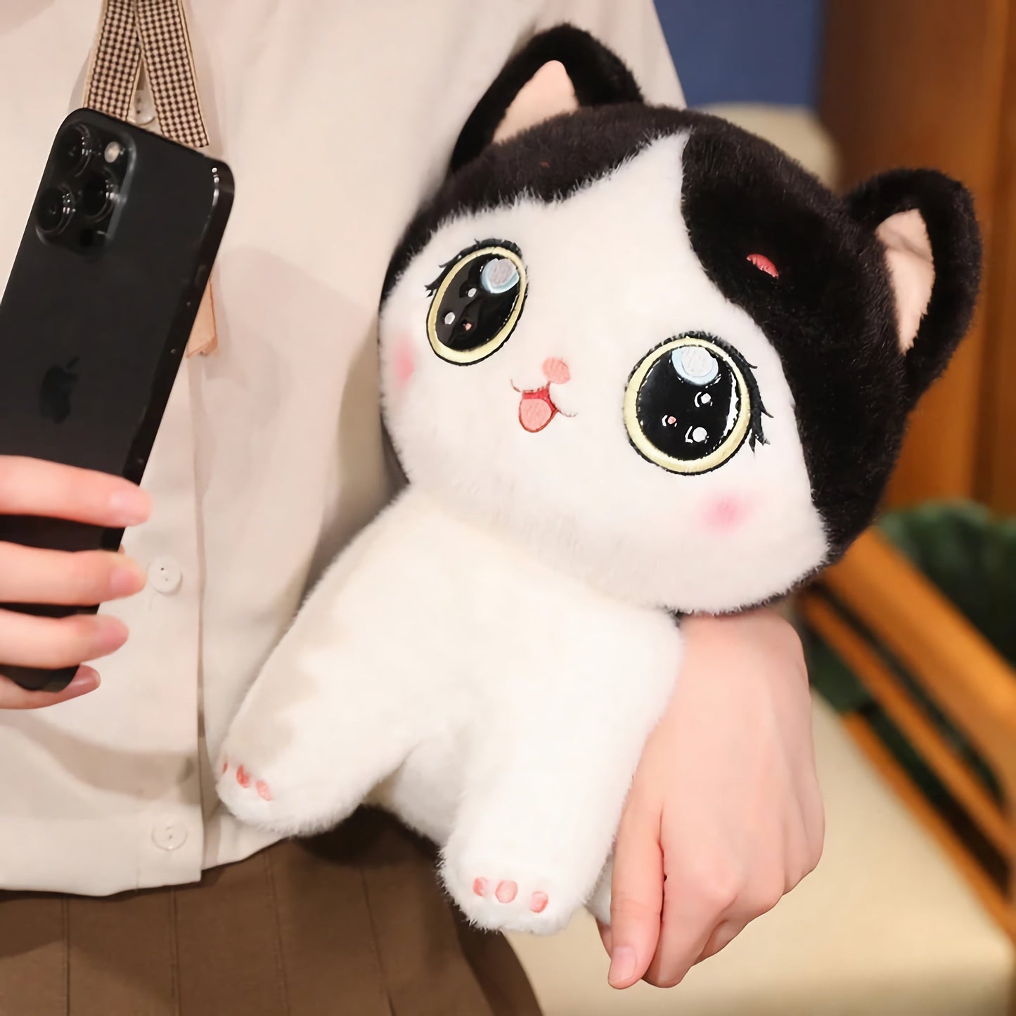 Cute kitten plush toy with large eyes