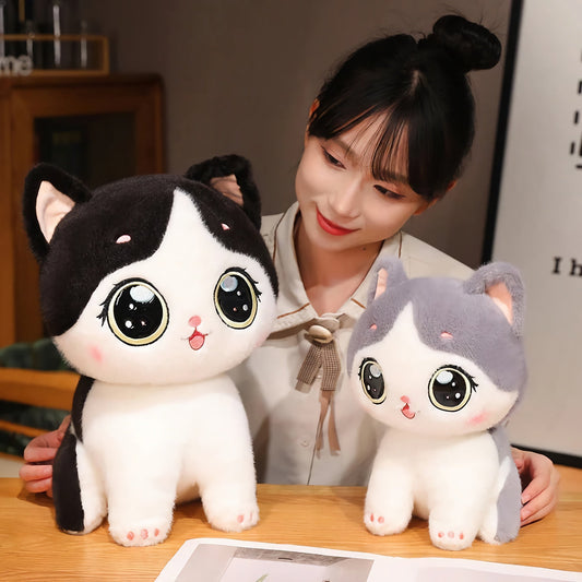 Cute kitten plush toy with large eyes