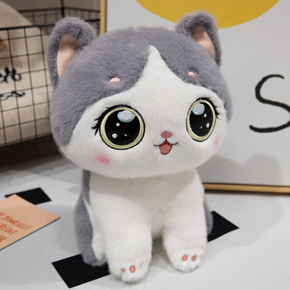 Cute kitten plush toy with large eyes